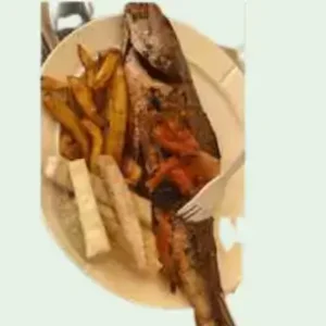 Grilled Cocker Fish with Plantain and Fried Yam with Pepper Sauce